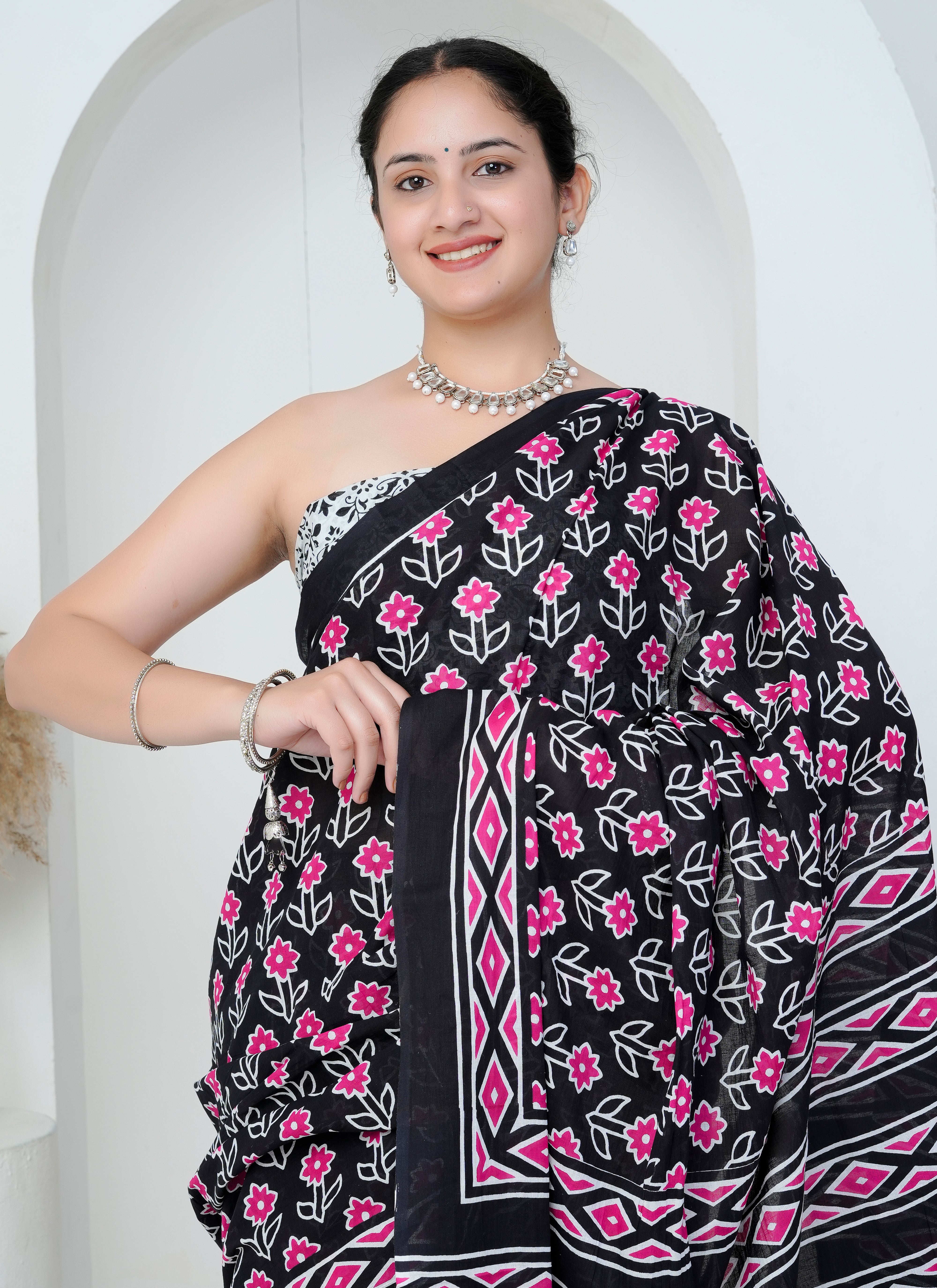 Black and Pink Floral Cotton Saree