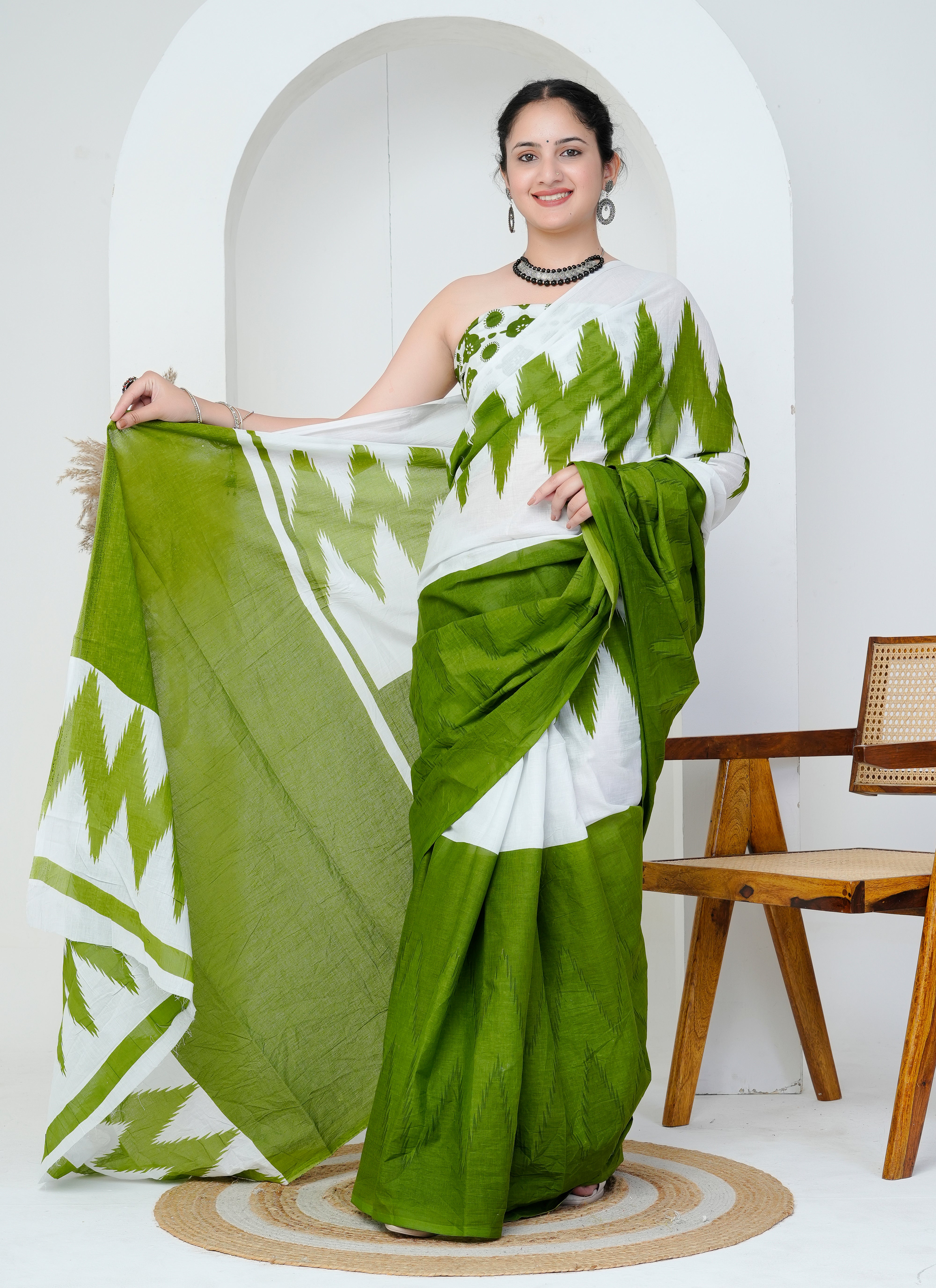 White and Leaf Green Ikat Cotton Saree