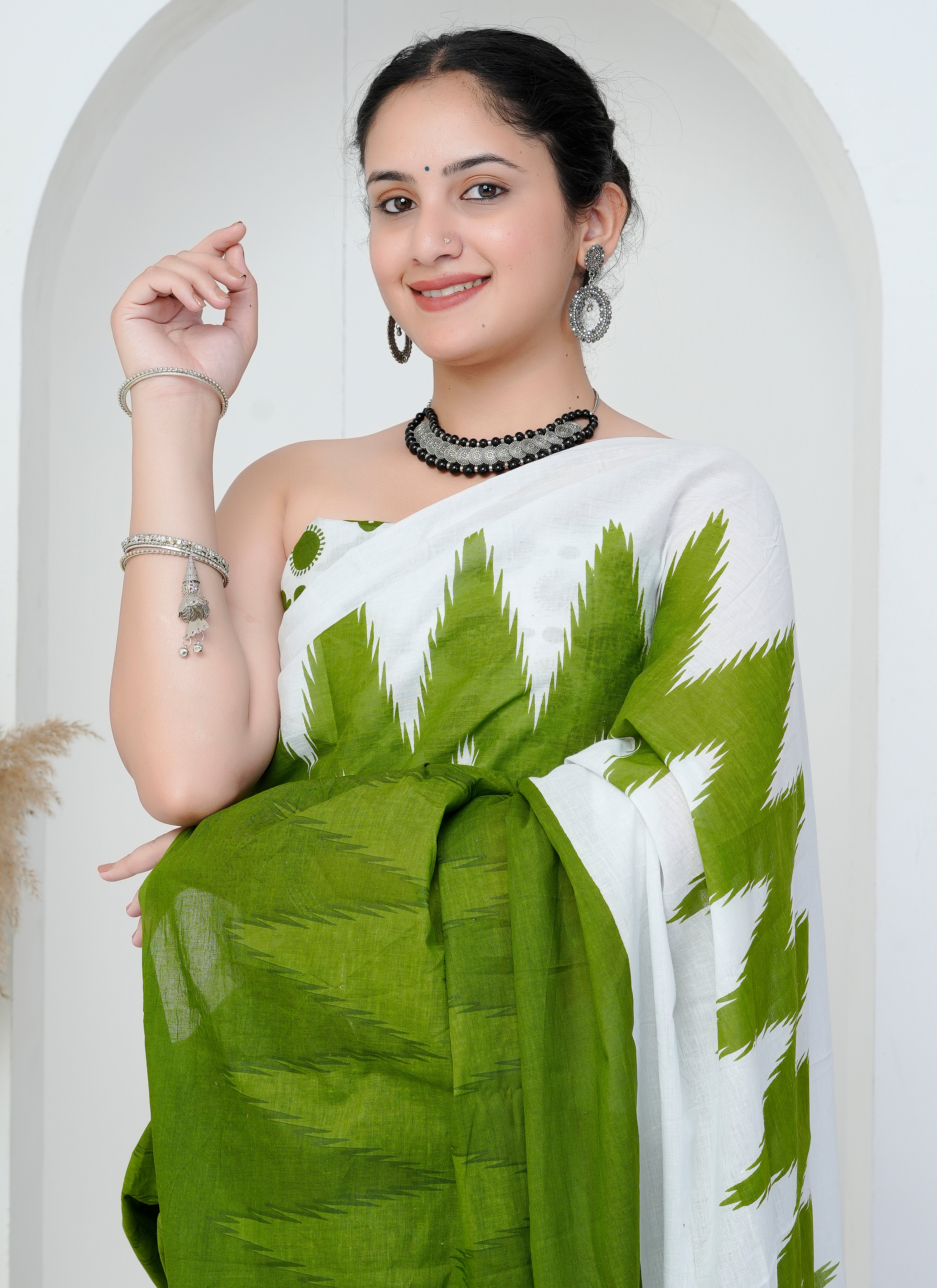 White and Leaf Green Ikat Cotton Saree
