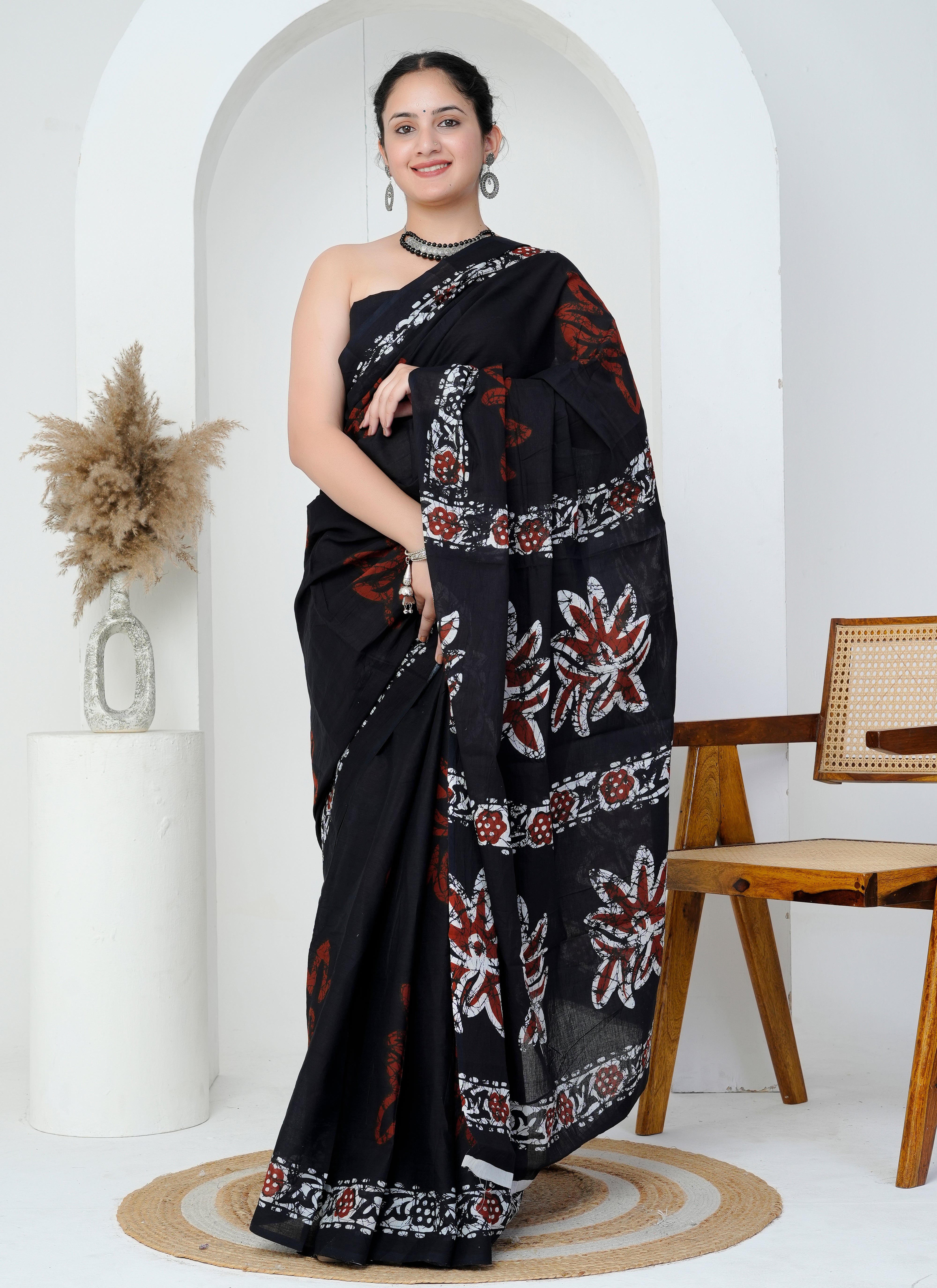 Black and Rust Red Floral Cotton Saree