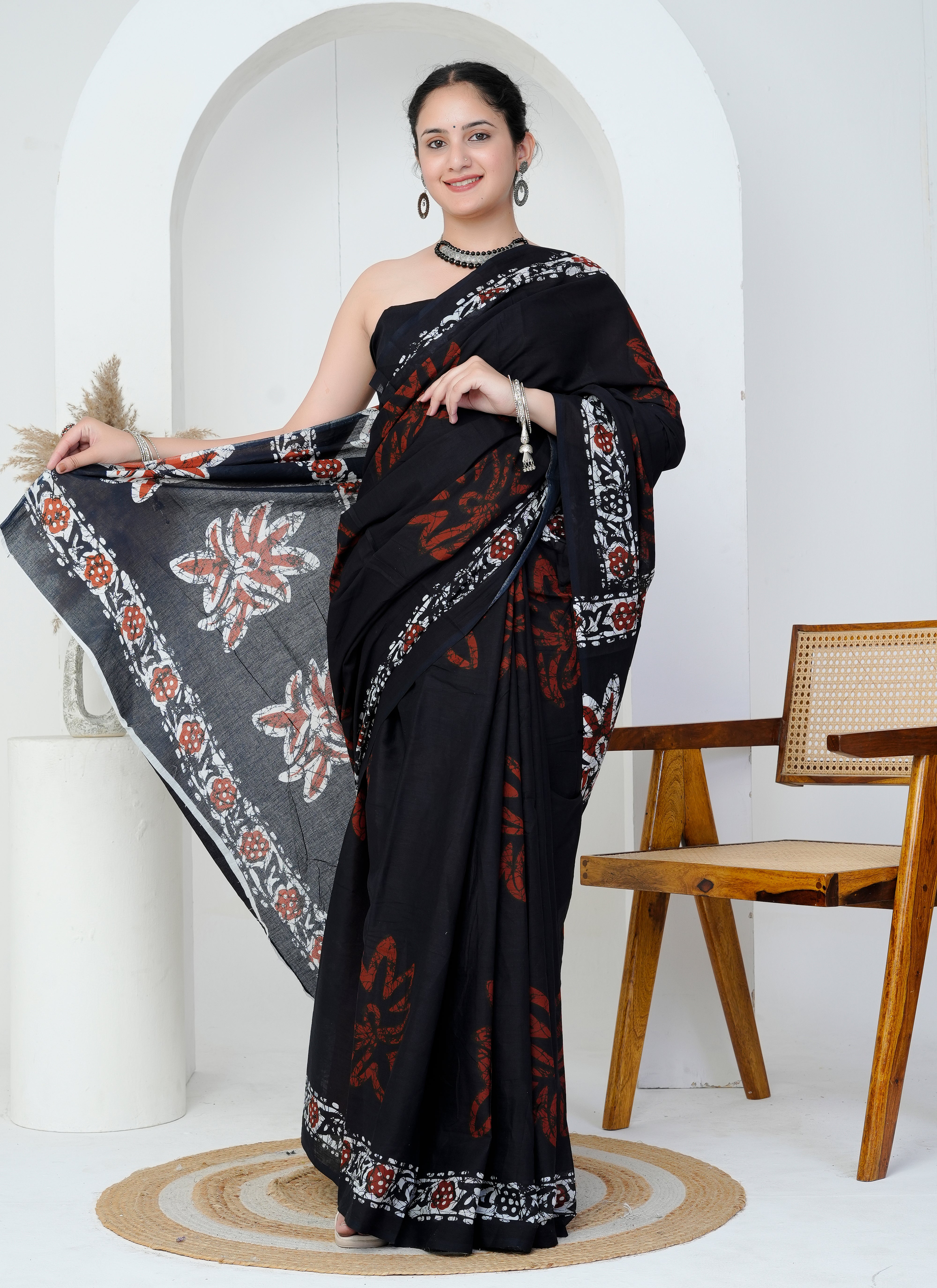 Black and Rust Red Floral Cotton Saree