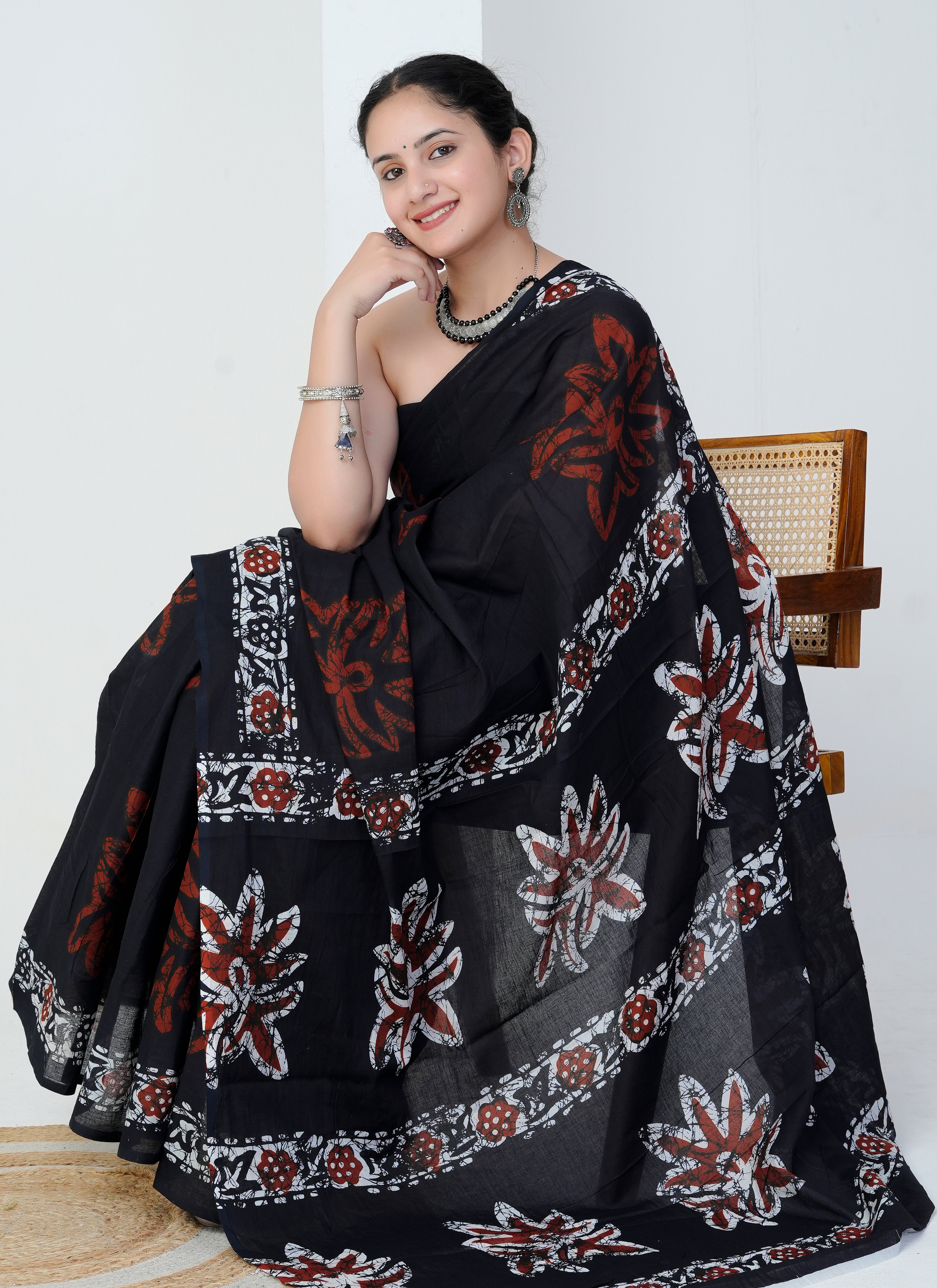 Black and Rust Red Floral Cotton Saree