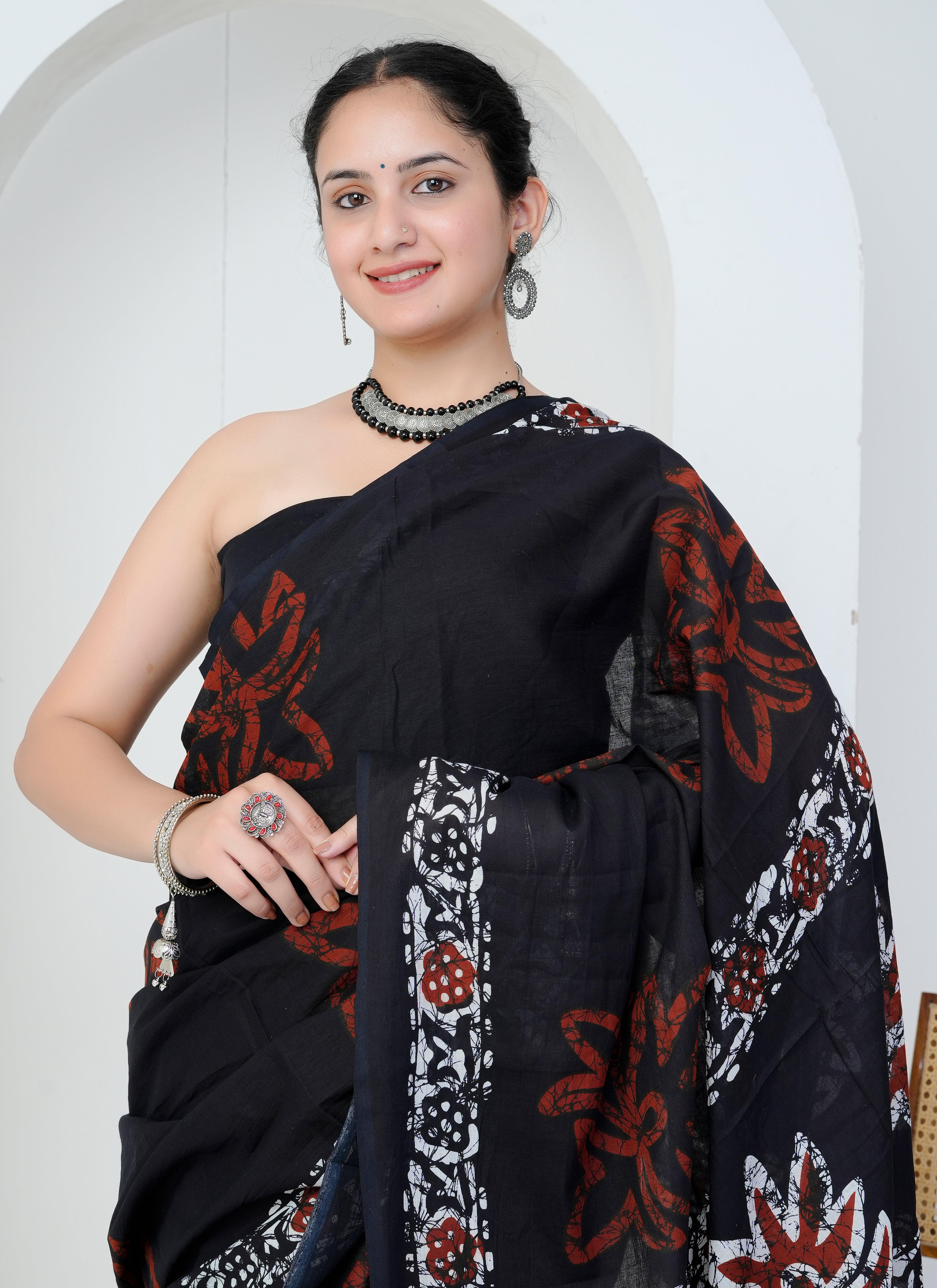 Black and Rust Red Floral Cotton Saree